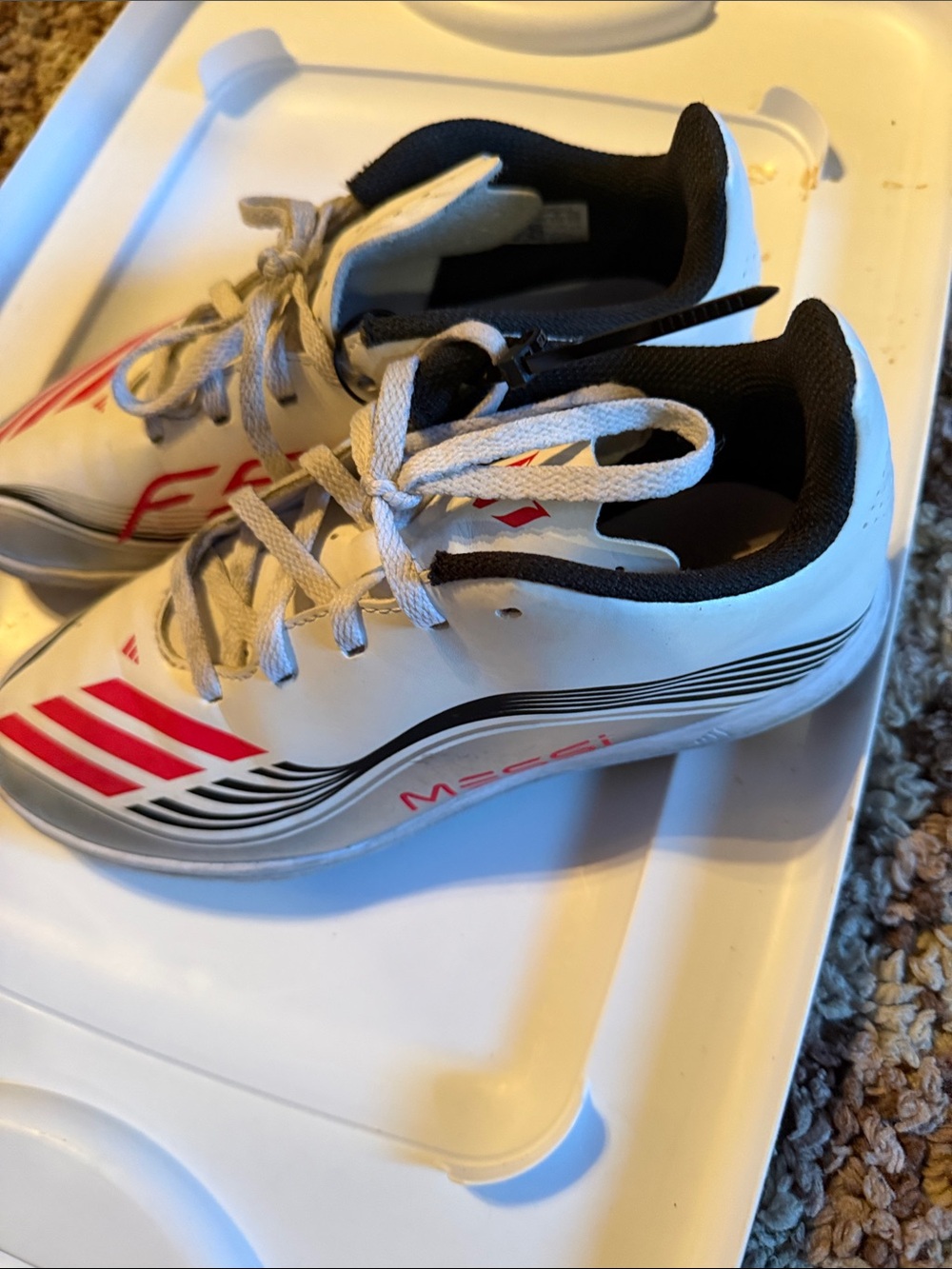 Kids White and Black Soccer Sneakers with Red Accents